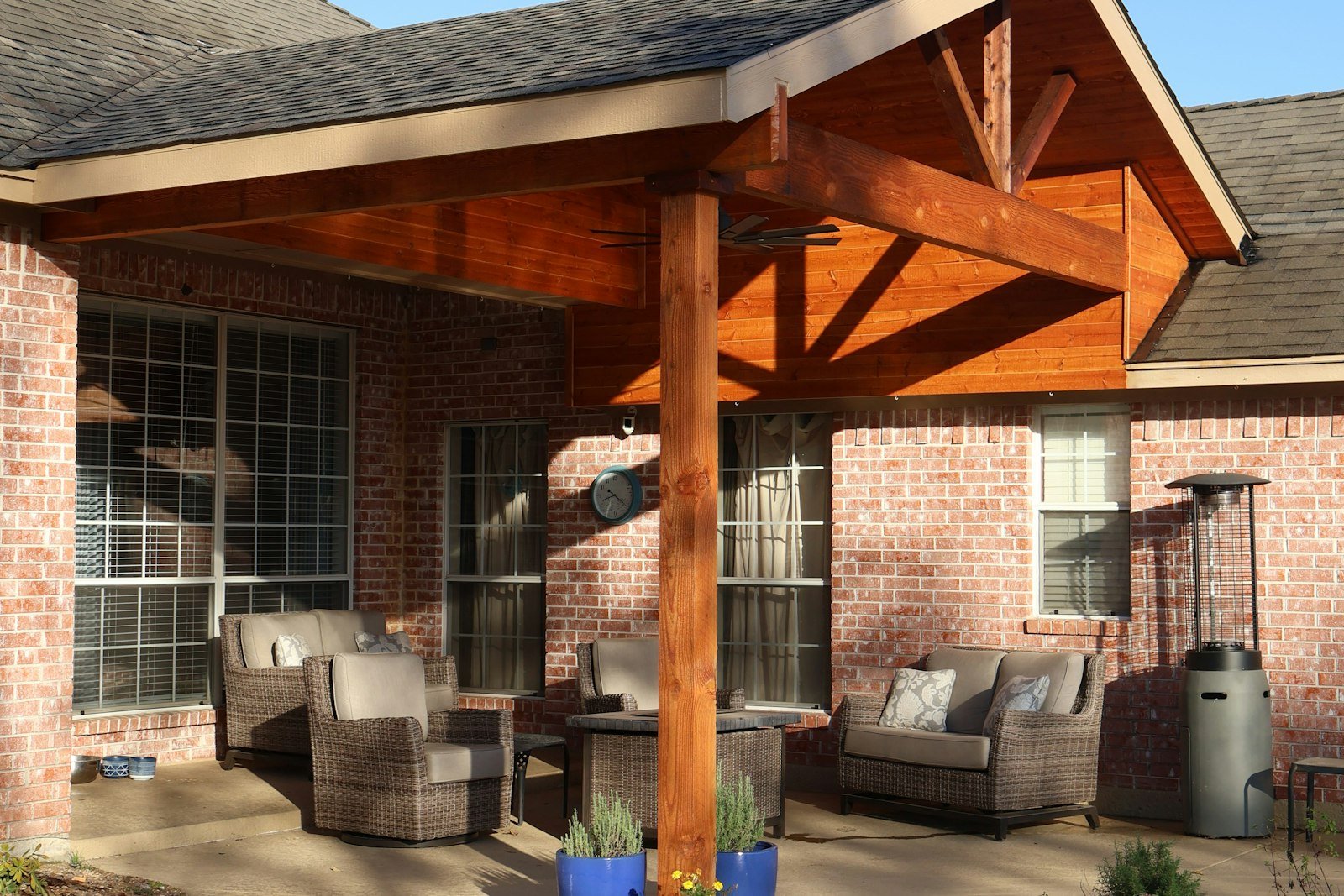 Covered porch with exposed timber rafters