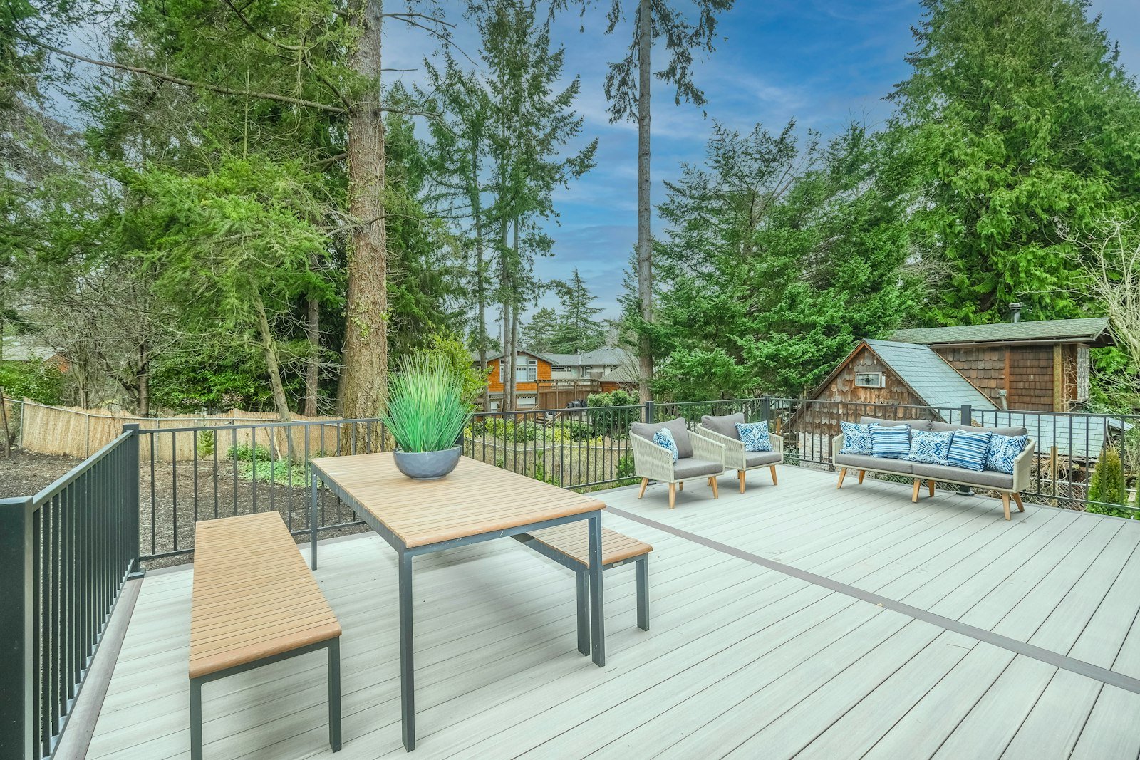 Outdoor dining terrace with a long table