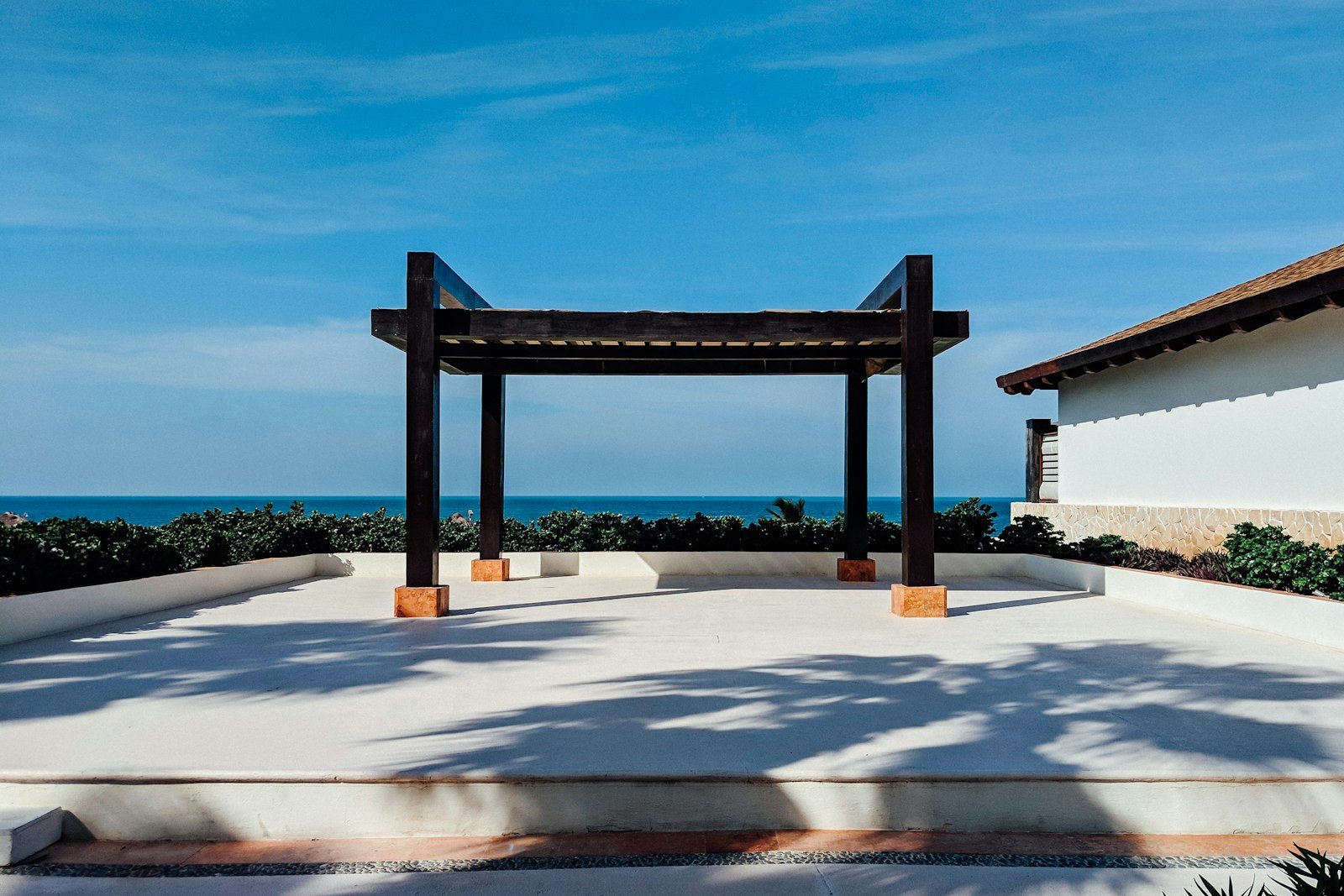 Pergola beside a swimming pool